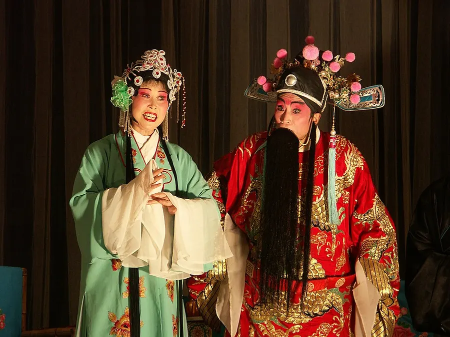 Sichuan Opera face-changing performer with a dramatic mask
